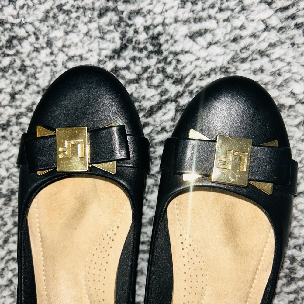 Elegant Black Leather London Fog  Flats with Gold Accents